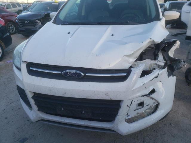 Photo 12 from auction – 2014 FORD ESCAPE SE with VIN 1FMCU9G99EUC69295