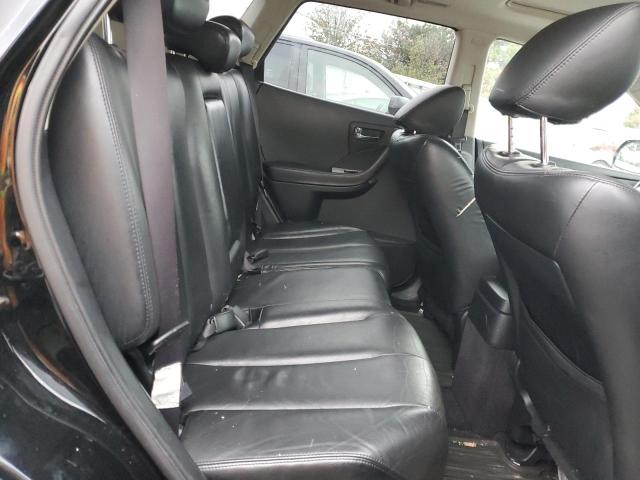 Photo 11 from auction – 2006 NISSAN UK with VIN JN8AZ08T96W404238