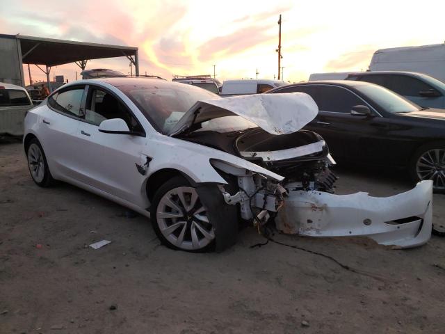 Photo 4 from auction – 2022 TESLA MODEL 3 with VIN 5YJ3E1EB9NF143083