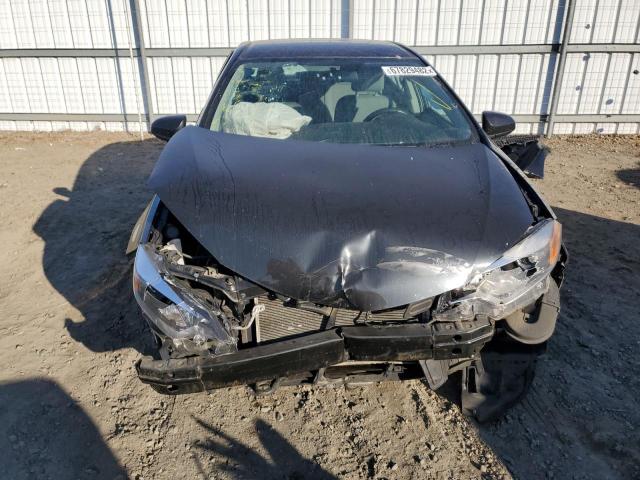 Photo 5 from auction – 2014 TOYOTA COROLLA L with VIN 2T1BURHE5EC077266