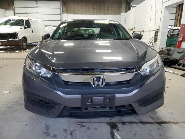 Photo 5 from auction – 2017 HONDA CIVIC LX with VIN 19XFC2F58HE003263