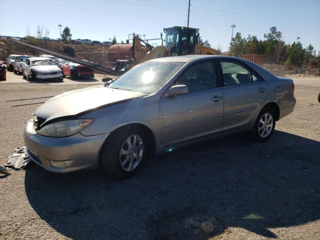 TOYOTA CAMRY LE 2005 with VIN 4T1BF32K15U599896 - Photo from auction