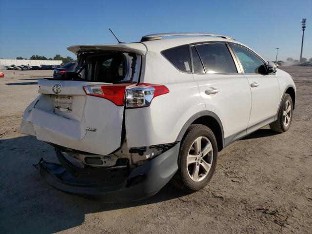 Photo 3 from auction – 2014 TOYOTA RAV4 XLE with VIN 2T3WFREV6EW102584
