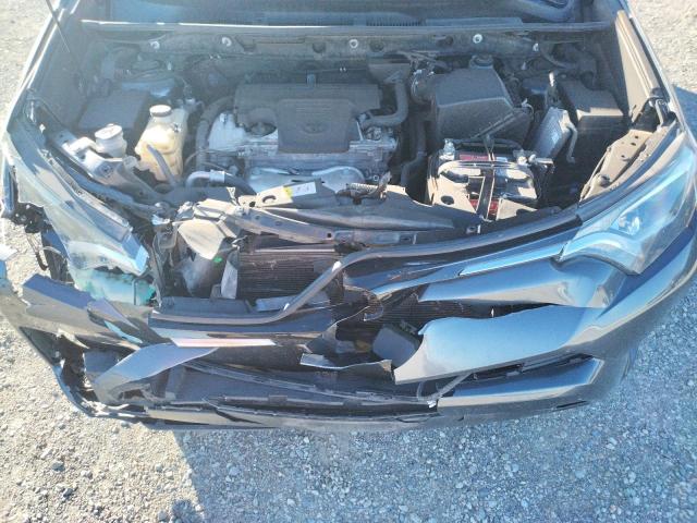 Photo 12 from auction – 2018 TOYOTA RAV4 LE with VIN JTMZFREV3JJ154891