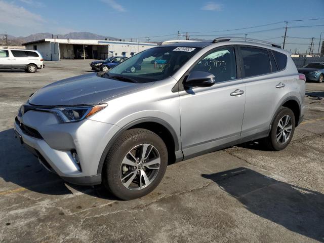 TOYOTA RAV4 XLE 2017 with VIN 2T3WFREV6HW371463 - Photo from auction