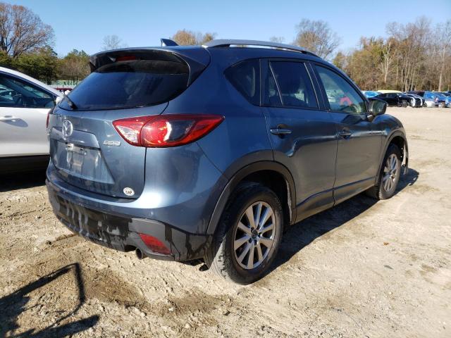 Photo 3 from auction – 2015 MAZDA CX-5 TOURI with VIN JM3KE4CY5F0471290