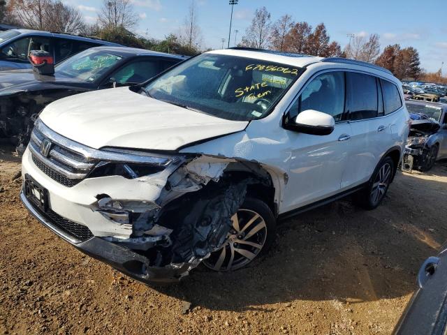 HONDA PILOT TOUR 2017 with VIN 5FNYF6H93HB095836 - Photo from auction