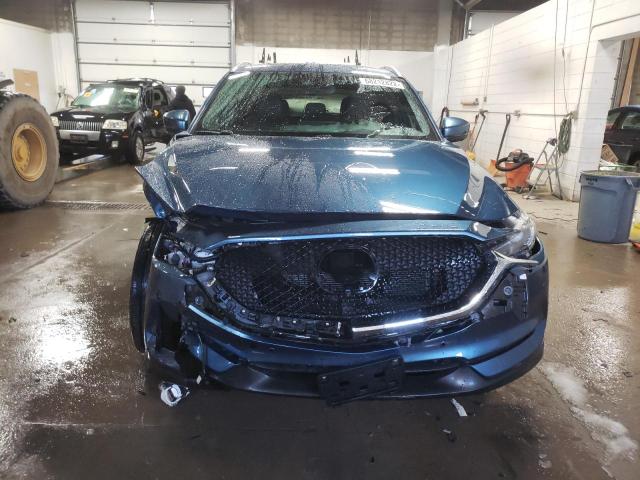 Photo 5 from auction – 2021 MAZDA CX-5 SIGNA with VIN JM3KFBEY0M0344202