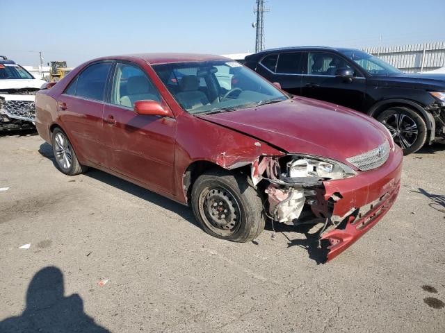 Photo 4 from auction – 2002 TOYOTA CAMRY LE with VIN JTDBE32K520038577