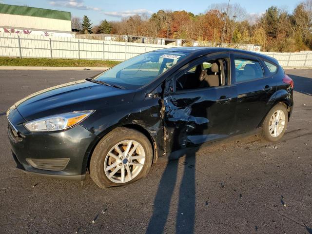 FORD FOCUS SE 2017 with VIN 1FADP3K21HL301230 - Photo from auction
