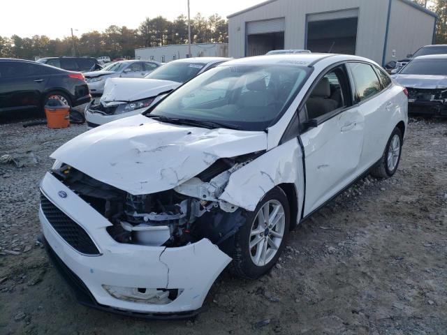 FORD FOCUS SE 2018 with VIN 1FADP3FE4JL248677 - Photo from auction
