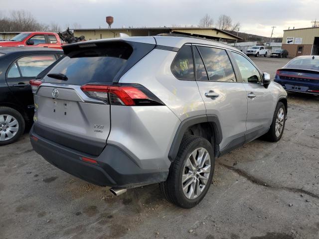 Photo 3 from auction – 2021 TOYOTA RAV4 with VIN JTMA1RFV8MD070210