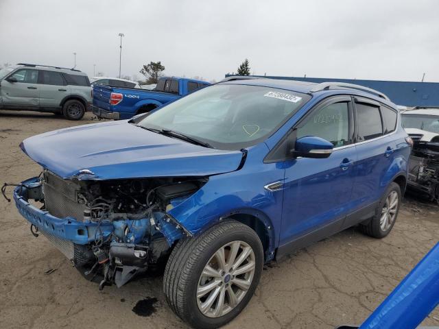 FORD ESCAPE TIT 2017 with VIN 1FMCU9J99HUE06930 - Photo from auction