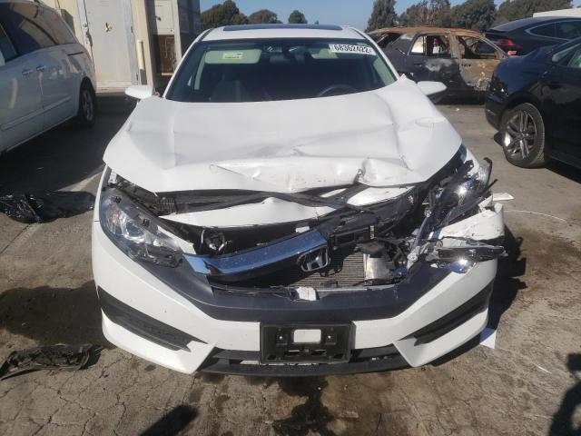 Photo 5 from auction – 2018 HONDA CIVIC EX with VIN 19XFC2F7XJE209868