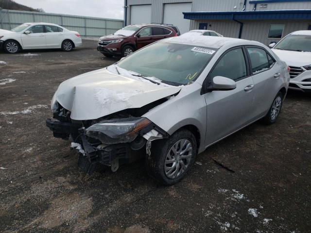 TOYOTA COROLLA L 2019 with VIN 5YFBURHE1KP868129 - Photo from auction
