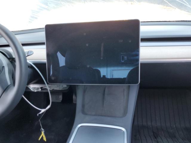 Photo 9 from auction – 2021 TESLA MODEL 3 with VIN 5YJ3E1EB1MF006704