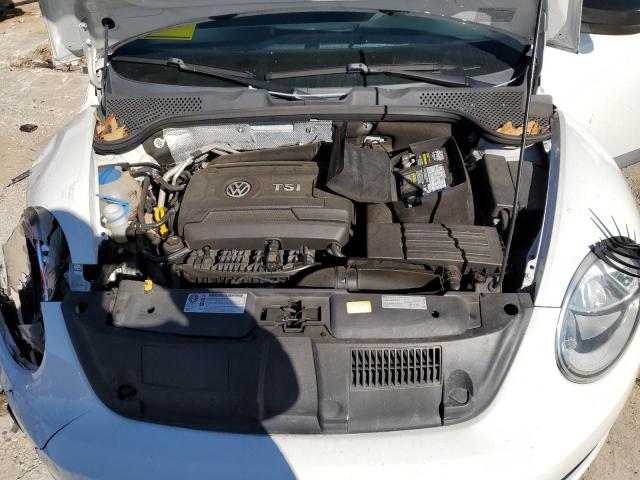 Photo 11 from auction – 2014 VOLKSWAGEN BEETLE with VIN 3VWF17AT3EM640763