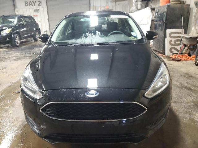 Photo 5 from auction – 2015 FORD FOCUS SE with VIN 1FADP3F27FL216853