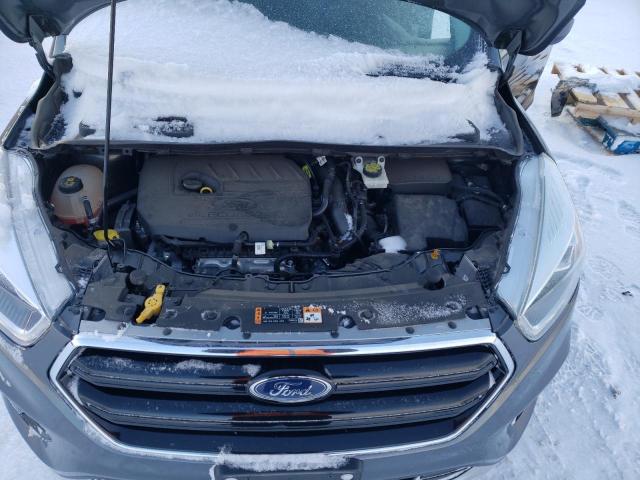 Photo 11 from auction – 2017 FORD ESCAPE SE with VIN 1FMCU9GD6HUC79808