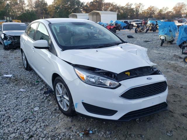 Photo 4 from auction – 2018 FORD FOCUS SE with VIN 1FADP3FE4JL248677