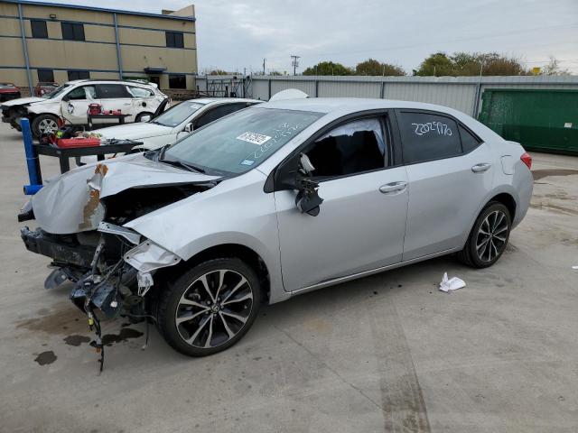 TOYOTA COROLLA L 2018 with VIN 5YFBURHE6JP799856 - Photo from auction