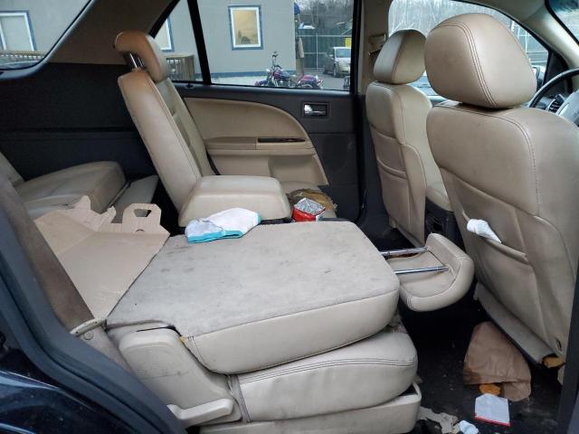 Photo 11 from auction – 2008 FORD TAURUS X L with VIN 1FMDK06W38GA06929