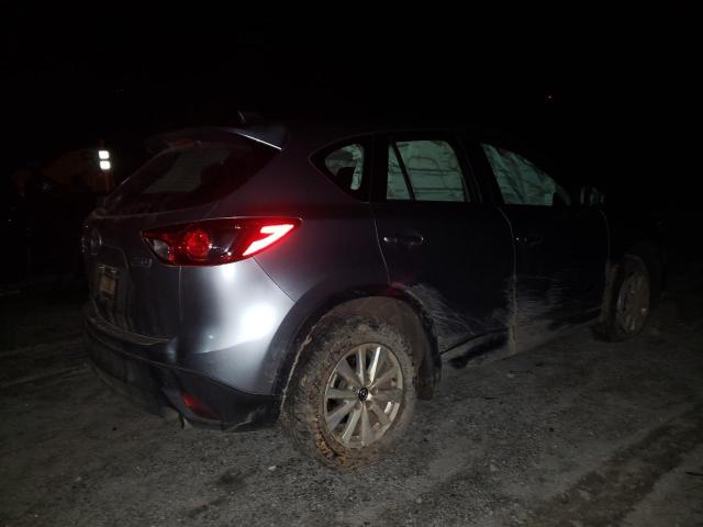 Photo 3 from auction – 2014 MAZDA CX-5 SPORT with VIN JM3KE4BE6E0319086