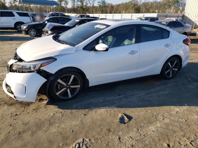KIA FORTE EX 2018 with VIN 3KPFN4A80JE257210 - Photo from auction