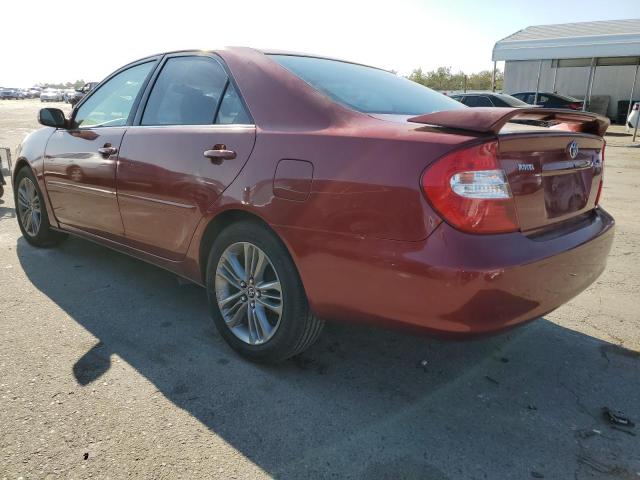 Photo 2 from auction – 2002 TOYOTA CAMRY LE with VIN JTDBE32K520038577