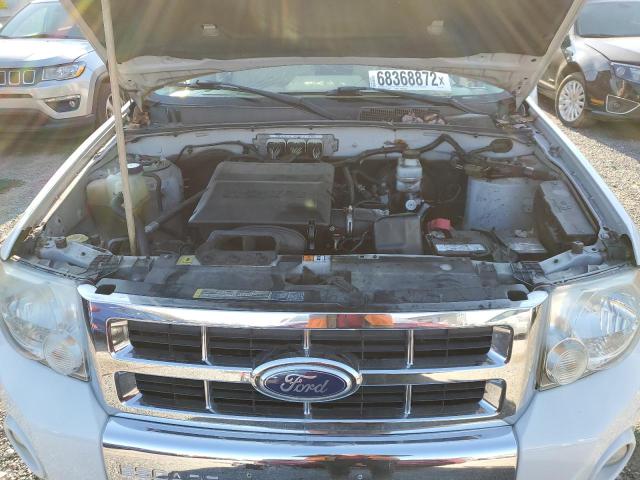 Photo 12 from auction – 2010 FORD ESCAPE LIM with VIN 1FMCU9EG5AKC77384