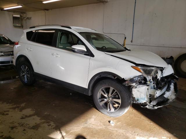 Photo 4 from auction – 2017 TOYOTA RAV4 XLE with VIN JTMRFREV2HJ154357