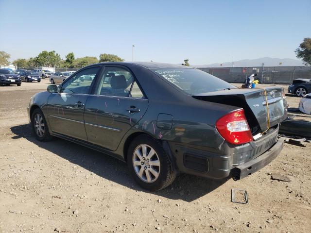 Photo 2 from auction – 2002 TOYOTA CAMRY LE with VIN JTDBF30KX20002349
