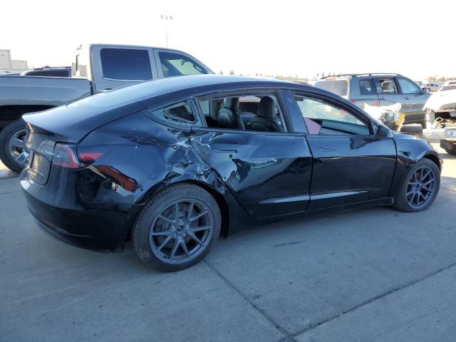 Photo 3 from auction – 2021 TESLA MODEL 3 with VIN 5YJ3E1EB1MF006704