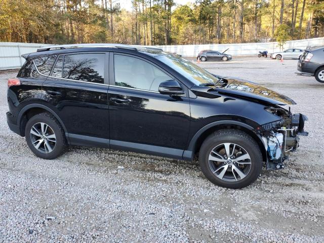 Photo 4 from auction – 2017 TOYOTA RAV4 XLE with VIN 2T3RFREV4HW634157