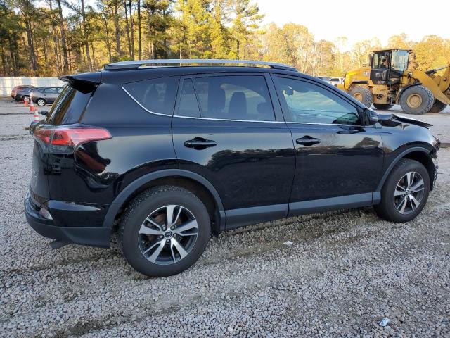 Photo 3 from auction – 2017 TOYOTA RAV4 XLE with VIN 2T3RFREV4HW634157