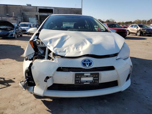 Photo 5 from auction – 2014 TOYOTA PRIUS C with VIN JTDKDTB34E1571157