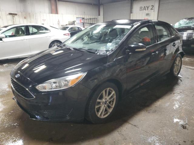 FORD FOCUS SE 2015 with VIN 1FADP3F27FL216853 - Photo from auction