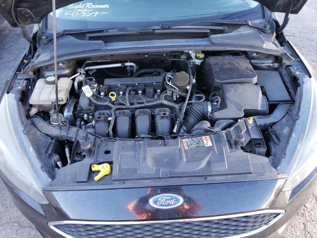 Photo 11 from auction – 2015 FORD FOCUS SE with VIN 1FADP3K21FL330305