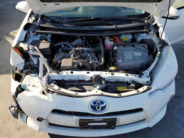 Photo 11 from auction – 2014 TOYOTA PRIUS C with VIN JTDKDTB34E1571157