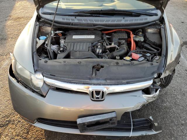 Photo 11 from auction – 2006 HONDA CIVIC HYBR with VIN JHMFA36206S027129