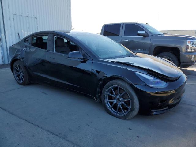 Photo 4 from auction – 2021 TESLA MODEL 3 with VIN 5YJ3E1EB1MF006704