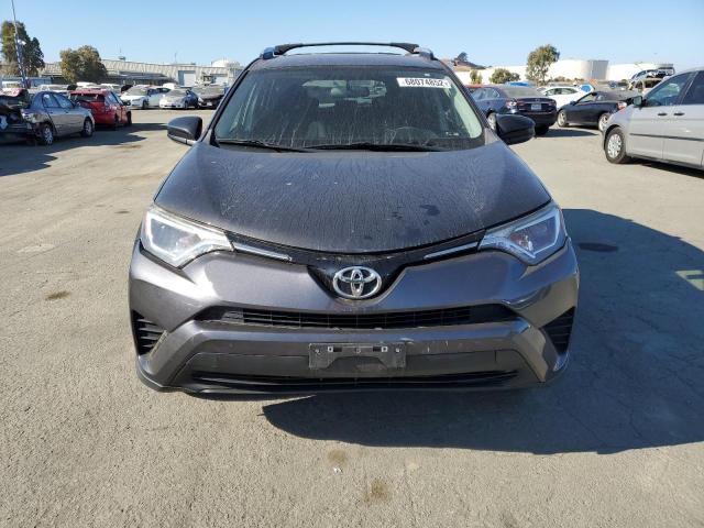 Photo 5 from auction – 2016 TOYOTA RAV4 LE with VIN JTMZFREV0GJ081410
