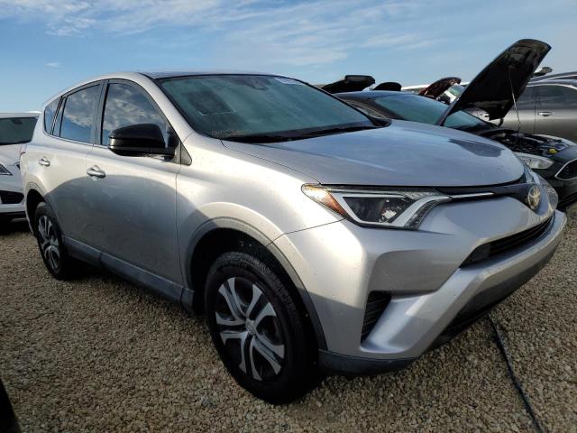 Photo 4 from auction – 2018 TOYOTA RAV4 LE with VIN 2T3ZFREV7JW416204