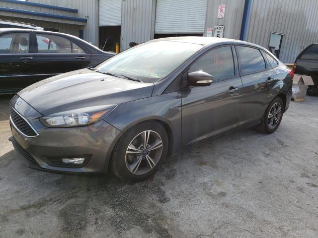 FORD FOCUS SE 2017 with VIN 1FADP3FE3HL306384 - Photo from auction