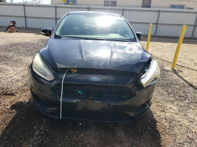 Photo 5 from auction – 2015 FORD FOCUS TITA with VIN 1FADP3J29FL277967