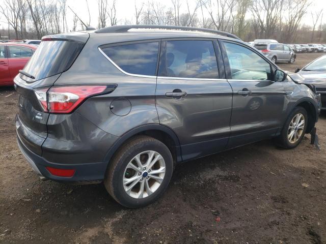 Photo 2 from auction – 2018 FORD ESCAPE with VIN 1FMCU9GD3JUB33162