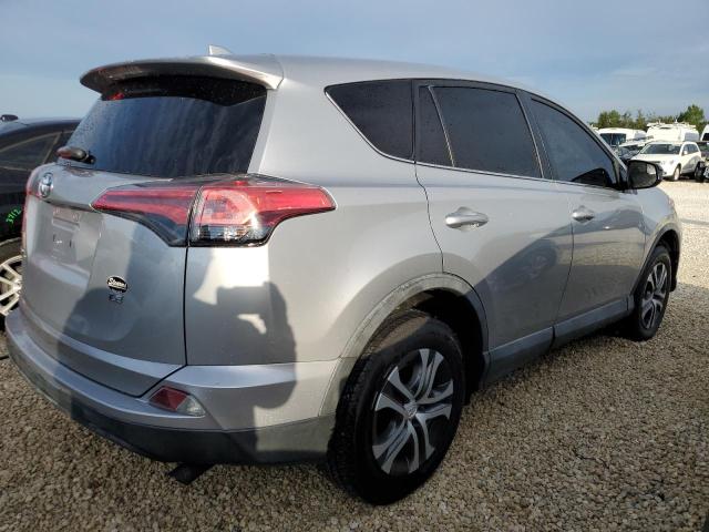 Photo 3 from auction – 2018 TOYOTA RAV4 LE with VIN 2T3ZFREV7JW416204