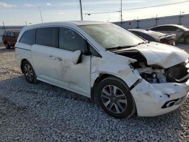 Photo 4 from auction – 2014 HONDA ODYSSEY TO with VIN 5FNRL5H91EB045195