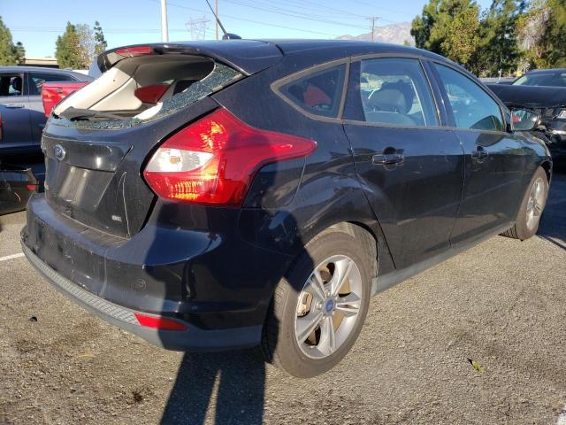 Foto 3 de la subasta – 2014 FORD FOCUS SE con VIN 1FADP3K23EL355494