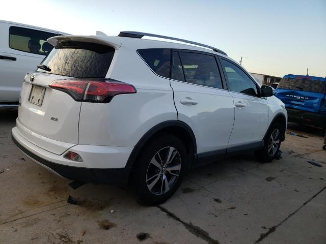 Photo 3 from auction – 2017 TOYOTA RAV4 XLE with VIN 2T3WFREV9HW394784